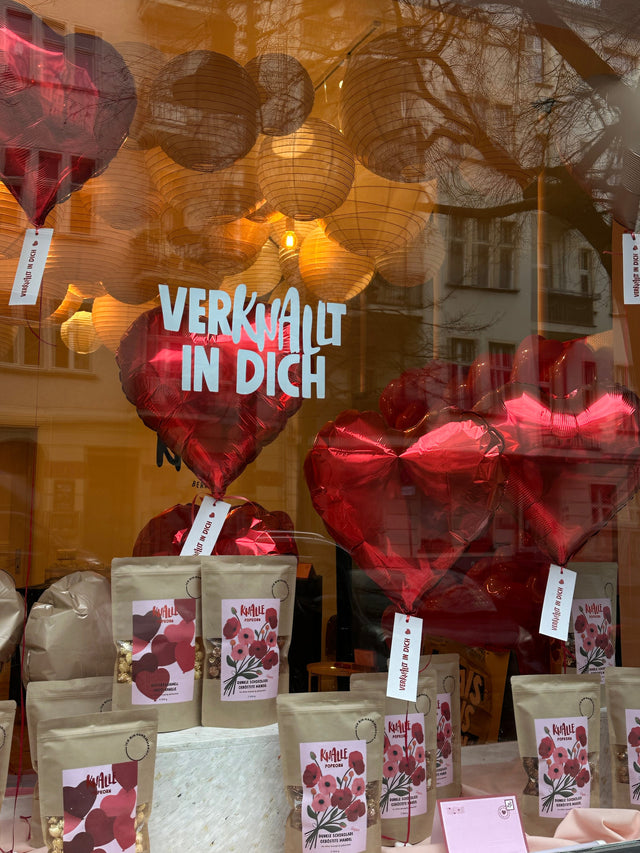 VerKNALLt in Dich: Liebe schenken mit Knalle